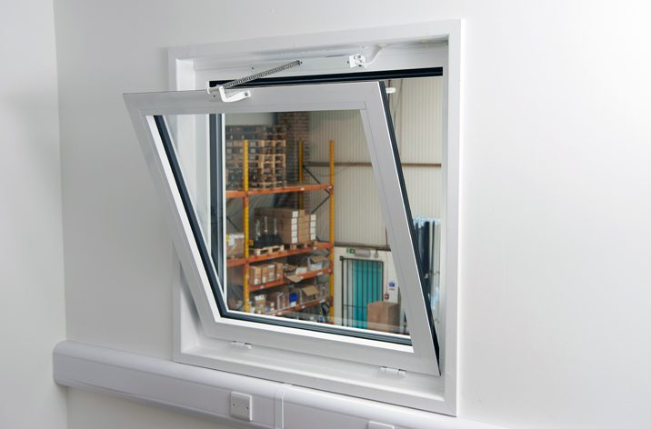 A partially open bottom hung inward opening window with window actuator