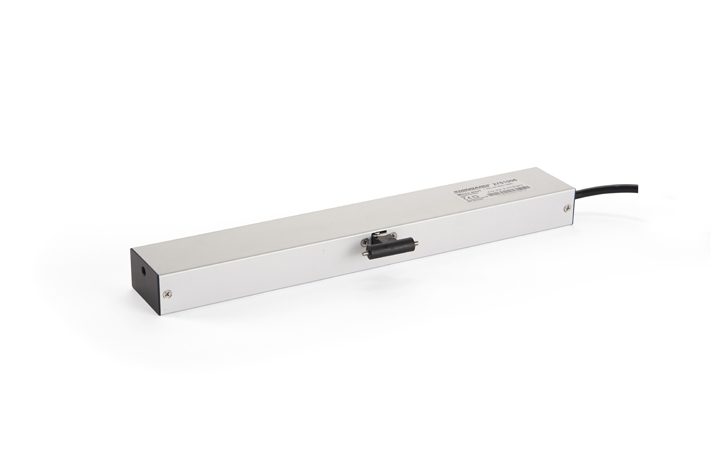 Mingardi Micro Evo1 Window Actuator. A silver rectangular electronic device with connector ports and a black cable attached at one end, perfect for integrating door automation systems.