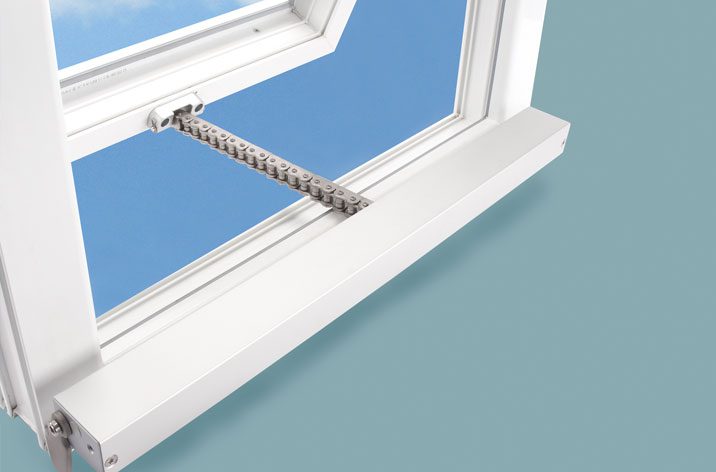 A partially open window with a visible chain mechanism against a light blue background showcases efficient natural ventilation.