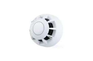 A white, circular smoke detector mounted on a white background.